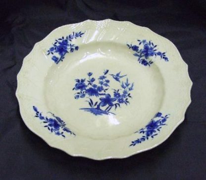 Assiette décor à l'oiseau.