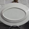 Plat oval en porcelaine de Tournai décor semi de fleurettes – Image 2